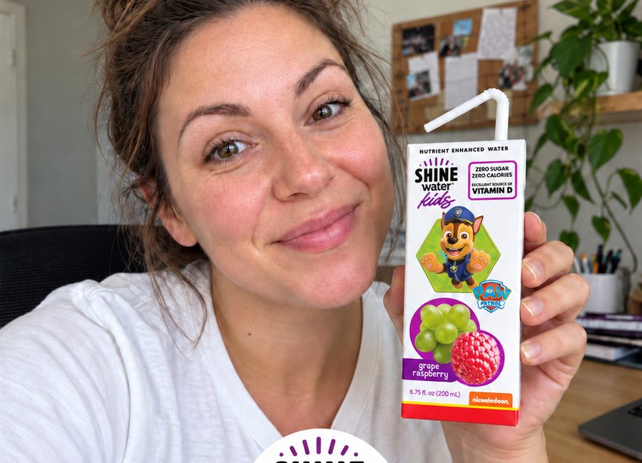 Parent creator holding a ShineWater Kids carton